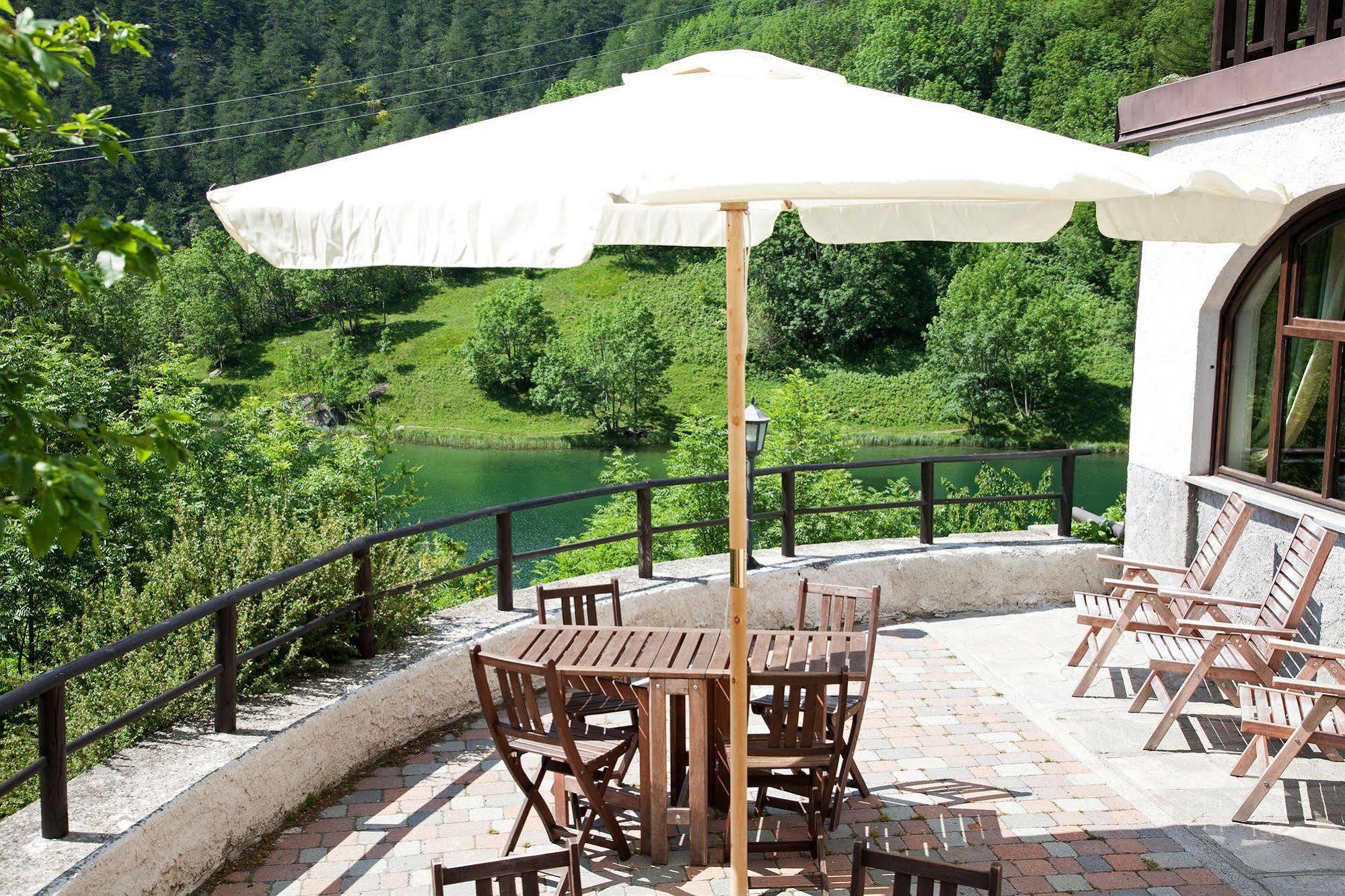 מונצ'ניזיו Chalet Sul Lago Hotel In Montagna מראה חיצוני תמונה